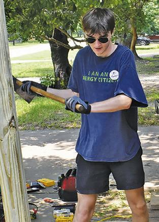 U.M. ARMY youth from the Houston area participate in a project on Monday in Somerville.