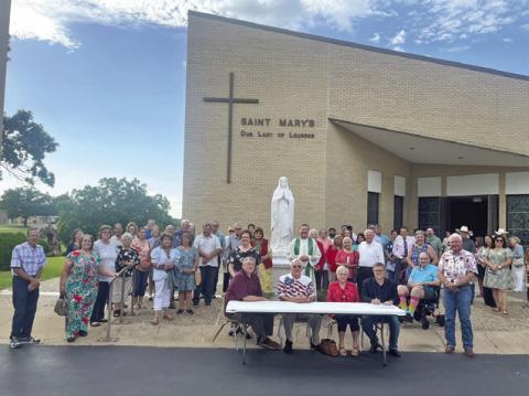 OFFICERS AND MEMBERS OF KJT Society #100, along with members of St. Mary’s Our Lady of Lourdes Catholic Church, celebrated Flag Day with the signing of a proclamation signed by Mayor John Rychlik. The KJT, Czech Catholic Union of Texas, encourages it’s members to recognize Flag Day each year in various ways. Society #100 appreciates the City of Caldwell and Mayor Rychlik for their cooperation with this project. Photo courtesy of Donna Rychlik