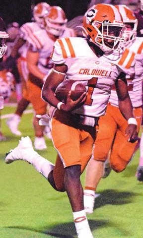 JAMAR HEWITT carries the ball for Caldwell. Hewitt gained 236 rushing yards.