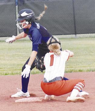 CAYLA BALANGA attempts to tag out a Mumford runner during the Somerville-Mumford game last Tuesday. -- Tribune photo by Roy Sanders