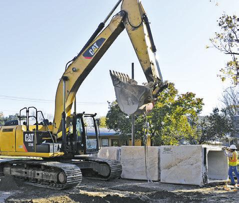 CONSTRUCTION CONTINUES ON Monday with the installation of these large box culverts on Harvey Street in Caldwell.