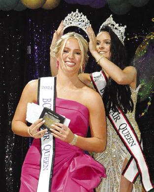LAST YEAR’S Fair Queen Kate Hill crowns Hadleigh Novosad as the 2024 Burleson County Fair Queen last Tuesday night. Tribune photo by Denise Squier