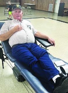 FRANKLIN KARASEK donates blood at the Red Cross Blood Drive at the VFW last week.
