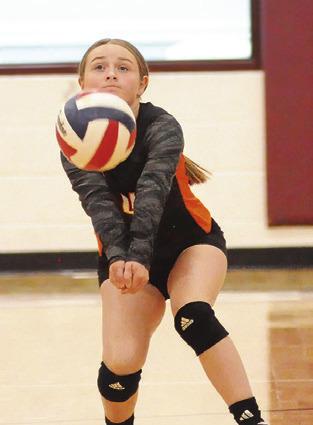 RHYAN RICCI bumps the ball during the Somerville-Hearne match last Friday. Tribune photo by Denise Squier