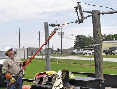 NICK BARTA OF Bluebonnet Electric Cooperative offers a demonstration for fifth-graders at Caldwell, Somerville and Snook on Thursday, May 7, during Burleson County Ag &amp; Health Day at the county fairgrounds. The event was held to teach in multiple settings.