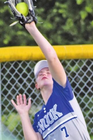 PAYTON SODOLAK catches a fly ball for an out during a Snook-Latexo bi-district playoff game. -- Tribune photo by Roy Sanders
