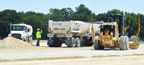AN LCRA CREW does the dirt work on Monday, Sept. 8, at the site of Caldwell’s new substation. Tribune photo by Roy Sanders