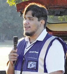 JACOB PENA SPOKE prior to the start of Saturday’s “Debbie’s 5K Color Walk,” hosted by the Pena Brothers Memorial. The organization supports local scholarships, local charities and education to prevent alcohol abuse. Tribune photo by Denise Squier
