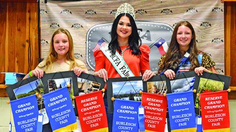 HEIDI AND HATTIE HERMANN WON grands in Junior Photography and Creative Arts. They are pictured with Fair Queen Kodi Hitchcock. Tribune photo by Sabine Lazo