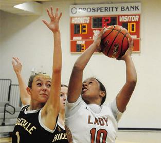 AVA JONES TRIES to get off a shot during the Caldwell-Bruceville-Eddy game last Monday. -- Tribune photo by Denise Squier