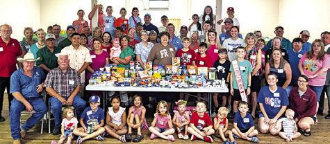 SPJST MEMBERS GATHER at the District 1 Rally to raise money and food donations for local food donation spots. Photo courtesy of Autumn Baker