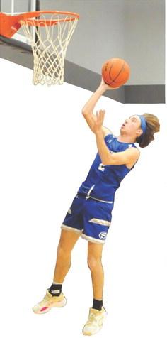 SNOOK’S BRETT Withem takes a shot against Mumford last Friday. Snook lost 58-40. Tribune photo by Denise Squier
