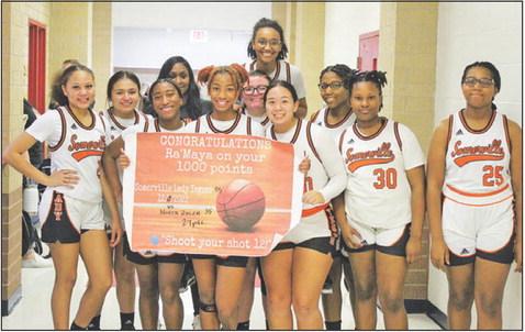 Carter scores 1,000th point