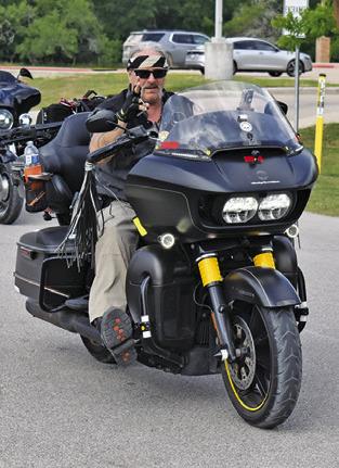 MOTORCYCLE RIDERS enjoy riding in the parade Saturday morning as part of the Crater Motorcycle Rally held last weekend at Welch Park at Lake Somerville.
