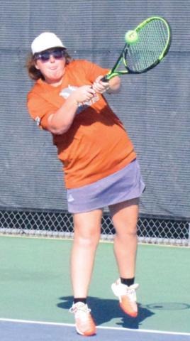 NEVA CRAVENS and her girls doubles partner Aletza Torres won their District 20-4A match against a Smithville duo with a perfect 6-0, 6-0. -- Tribune photo by Denise Hornaday