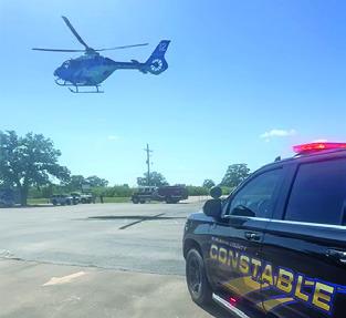 A HELICOPTER takes off on Monday, July 27, to transport this assault victim from Somerville to a Temple hospital. Photo courtesy of Pct. 4 Constable’s Office