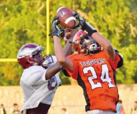 GARDNER SHIVERS makes a play for Somerville against Hearne last Friday.