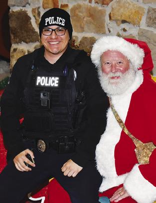 SANTA CLAUS greets everyone on Saturday during the Santaville celebration at the Yegua Center in Somerville. See more photos inside.