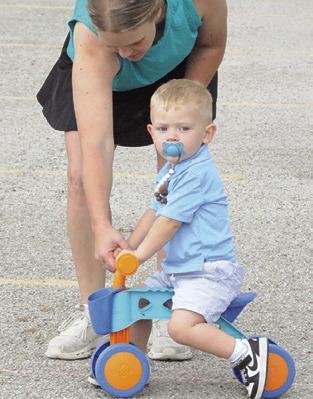CHILDREN OF all ages and skill levels participated in Friday’s bicycle rodeo, sponsored by Texas A&amp;M AgriLife Extension. Fifty bicyclists and scooter riders attended the event at John E. Hejl Park at the Davidson Creek soccer fields in Caldwell. Tribune photo by Denise Squier