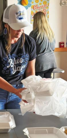 HAMBURGER STEAK plates were on hand at Sunday’s Snook Education Foundation’s “grab-and-go” lunch fundraiser.