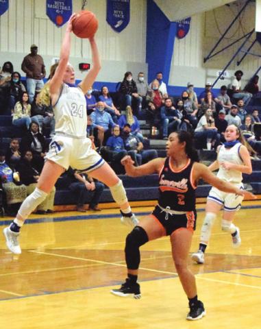 SNOOK’S JAYCIE BRISCO GRABS a pass from a teammate during a fast break while Somerville’s Jazmine Jackson defends during the Lady Jays’ win last Friday night. -- Tribune photo by Denise Squier