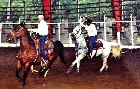 HODGES ON HIS “ONE-OF-A-KIND” horse, Rebel, heeling at a local roping. Photo courtesy of Alfred Hodges