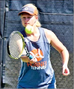 PAIGE ODENBACH and her doubles partner Neva Cravens won their girls doubles match against a duo from Smithville on Saturday.