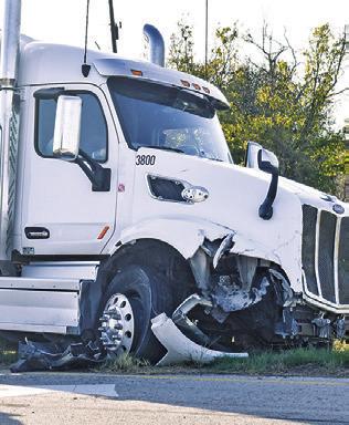 THIS 18-WHEELER was damaged in a multivehicle pileup accident on Tuesday, Nov. 5, on State Highway 21 East and County Road 300. Tribune photo by Roy Sanders