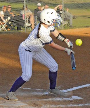 KYLIE COOPER BUNTS during the Snook-Somerville game last Friday in Snook. Tribune photo by Denise Squier