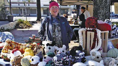 JULIE GEESLIN OF Rebel’s Yarn N Paws appeared on Sunday, Feb. 1, at the Somerville Farmer’s &amp; Artisans Market in Somerville. Tribune photo by Roy Sanders
