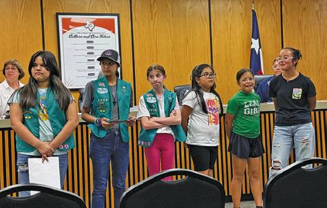 AREA GIRL SCOUTS WERE recognized during Monday’s Caldwell School Board meeting. The Girls Scouts collected 1,000 pounds of plastic and used that collection to make a “buddy bench” to place on the Caldwell Intermediate School campus. Tribune photo by Denise Squier