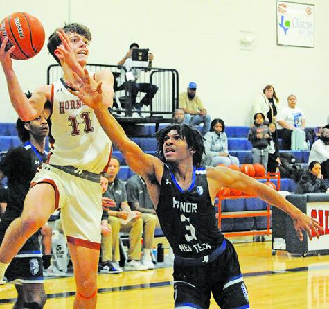 Hornets hold on for 66-65 win at Taylor