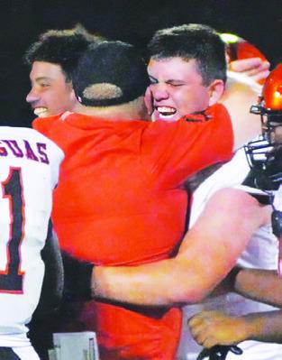 NIC CONNELLY celebrates Somerville’s 42-41 overtime victory of Burton last Friday.