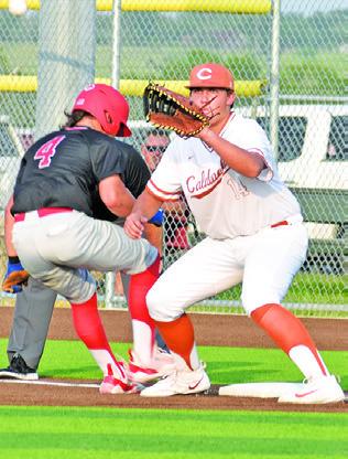 CALDWELL FIRST baseman Preston Supak prepares to make this catch and tag this Salado player. -- Tribune photo by Roy Sanders