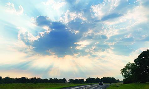 THESE VIBRANT SUNBEAMS were visible for motorists along F.M. 3058 for about 10 minutes on Sunday afternoon, May 5.