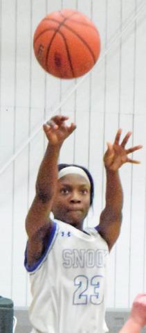 BRE’ANNA LOUIS shoots the ball during the Snook-RTC game last Thursday in Dime Box.