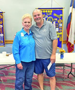 CBC LIONS CLUB President Johanna Elliott presents a check to Mike Patranella for the Caldwell Boys and Girls Club this past Thursday.