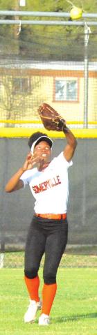 CAMIA MARTIN SETS to catch a fly ball for an out during the Somerville-Iola game last Friday. -- Tribune photo by Denise Squier