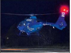 A HELICOPTER transports a patient on Thursday, Nov. 20, at an accident on State Highway 21 West near F.M. 60. No details on the accident were available at press time.