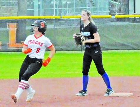 SOMERVILLE’S AVERIE HERNANDEZ ROUNDS second base during the Lady Yegua’s 14-0 win over Brazos Christian last Thursday.