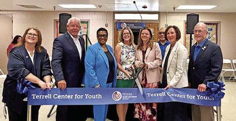 SEN. LOIS KOLKHORST, second from the right, attends the ribbon cutting ceremony for the newly created Terrell Youth Center.
