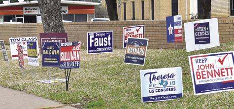 THESE POLITICAL SIGNS are placed at the Burleson County Courthouse. Voters will cast ballots Tuesday in the primaries.