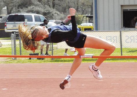 SNOOK’S DAKOT KIENOW places first in the girls varsity high jump at last week’s Koppers Relays with a height of 5 feet 2 inches. Tribune photo by Denise Squier
