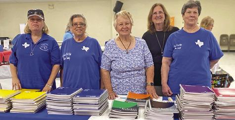 LYONS EDUCATION EXTENSION Association Club donated spiral notebooks to the “Back to School Blast.” Pictured, from left, are, Terri Sissoms, Tammy Qualls-Tucker, Sharon Stevenson, Debbie Schumacher and Brenda Kolojaco. Photo courtesy of the Lyons EEA