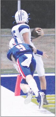 JOSH GREEN OF Snook makes a catch against Brazos Christian. Tribune photo by Denise Squier
