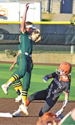 AVERY SMITH SLIDES safely into second during the Caldwell-Lexington game last Friday. -- Tribune photo by Roy Sanders