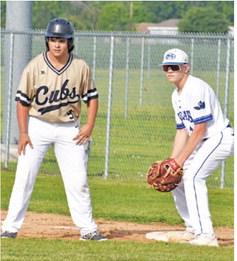 SNOOK’S KADE JUNEK watches carefully from first base.