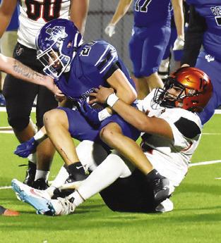 ANDY ESPINOZA makes a tackle against Ben Bolt. Somerville won the area playoff 46-12. Tribune photo by Roy Sanders