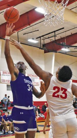 JEREMIAH POWELL of Snook takes a shot against Bremond in last Friday’s game. Tribune photo by Roy Sanders