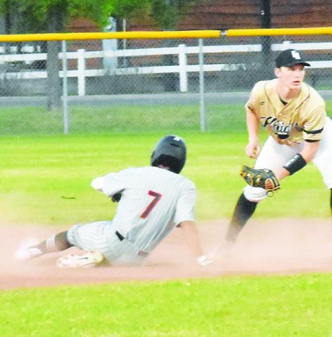 SOMERVILLE’S VICTOR OROZCO slides into second base last Friday against Bellville Faith Academy. -- Tribune photo by Roy Sanders